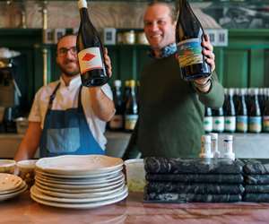 chef and some holding wine